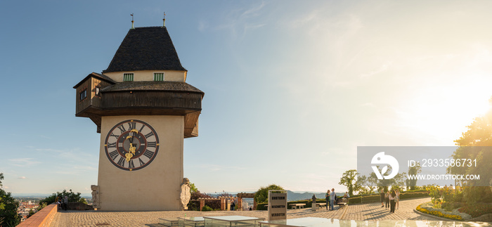 The clock tower, Uhrturm in Graz City. Famous historic structure on summer day