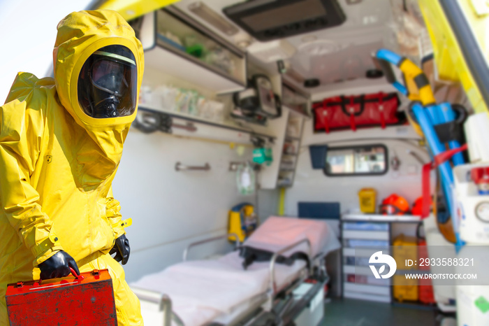 Ambulance and equipment views from inside and man  in yellow protective hazmat suit.  Epidemic virus.