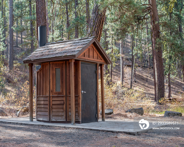 Rustic Wooden Vault Toilet that serves as the restroom facilities provided by the Forest Service at Drews Creek Campground