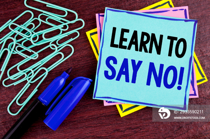 Handwriting text Learn To Say No Motivational Call. Concept meaning Encouragement advice tips morality values written Sticky Note Paper wooden background Marker and Paper Clips next to it.