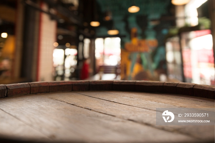 Beer. Still life with Vintage beer barrel and glass light beer. Fresh amber beer concept. Green hop and gold barley on wooden table. Ingredients for brewery. Brewing traditions