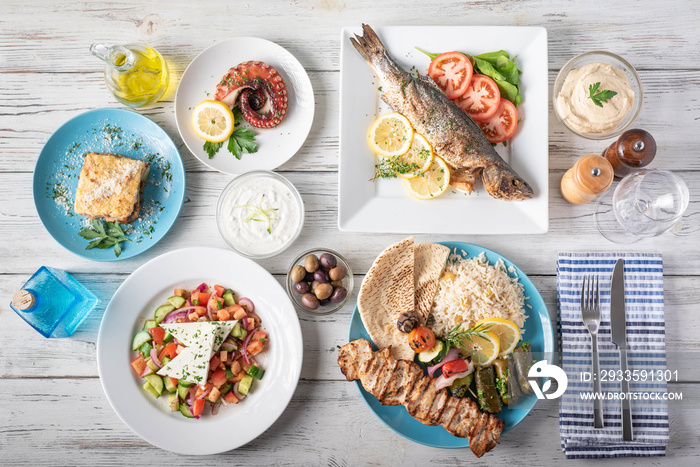 assorted popular greek plates with flat lay angle