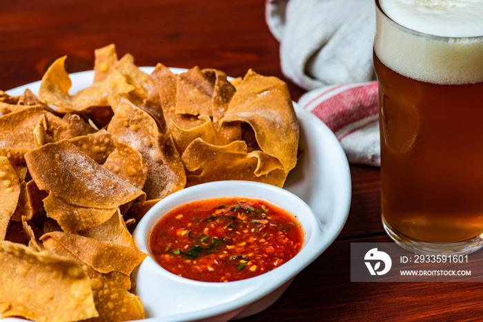 Mexican corn chips with salsa sauce