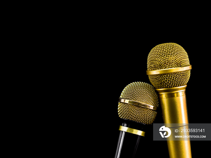 Couple microphone on black background.  Object for media entertainment concept.