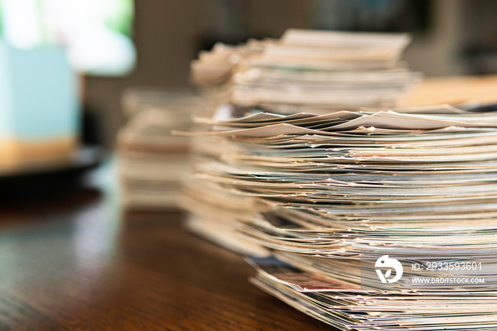 Stack of old photo prints and Memories to be digitized a