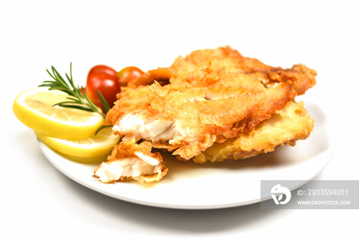 fried fish fillet sliced for steak or salad cooking food with herbs spices rosemary and lemon - tilapia fillet fish crispy served on white plate