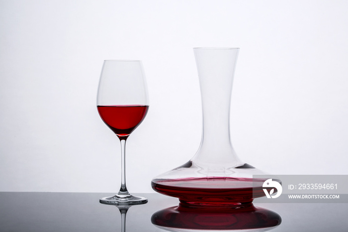 decanter with red wine and glass