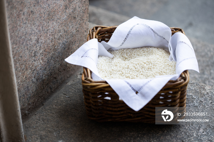 basket of rice outside the church