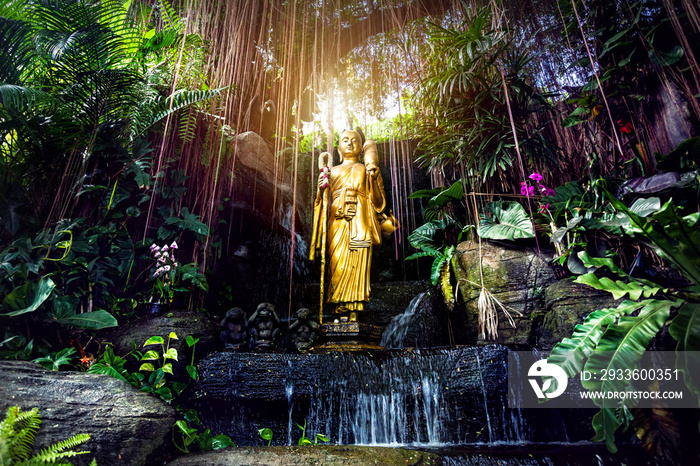 Golden Buddha statue in the garden