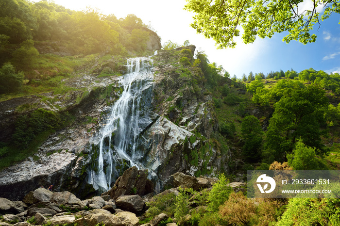 Majestic water cascade of Powerscourt Waterfall, the highest waterfall in Ireland.