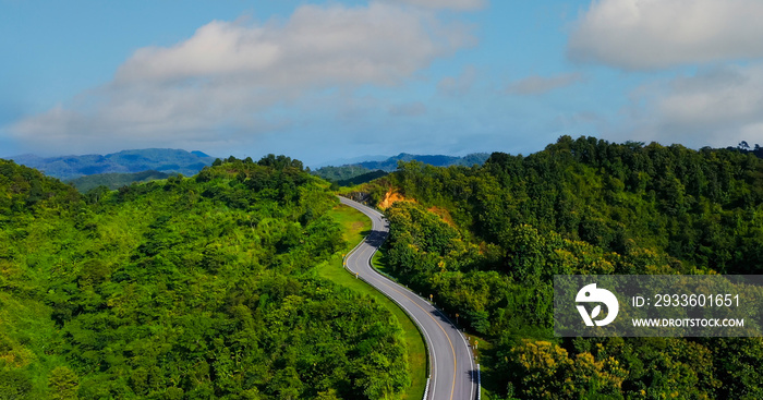 The highway stairs to the sky of road trough with green forest  as the nature landscape background