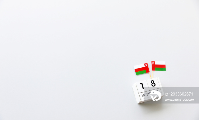 NOVEMBER 18 Wooden calendar Concept independence day of Oman and Oman national day.top view with space for your text