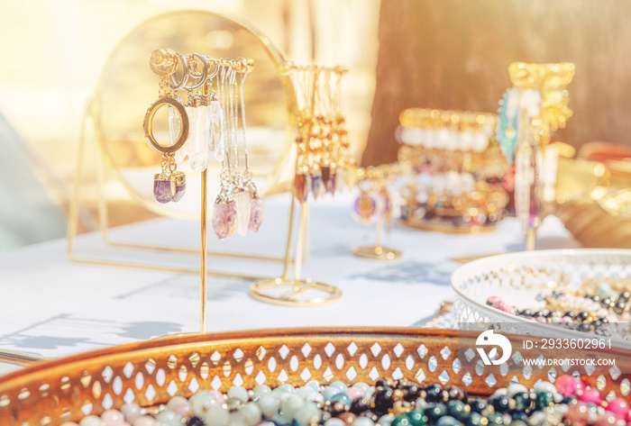 beautiful jewelry on the table, jewelry with healing stones.