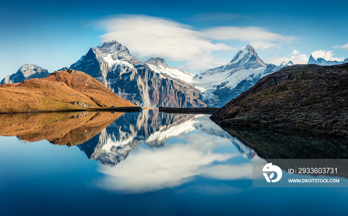 Splendid norning view of Bachalp lake / Bachalpsee, Switzerland. Fantastic autumn scene of Swiss alps, Grindelwald, Bernese Oberland, Europe. Beauty of nature concept background.