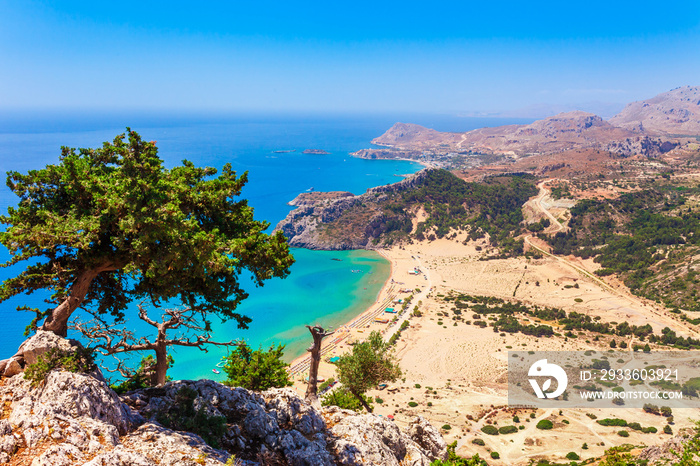 Sea skyview landscape photo Tsambika bay on Rhodes island, Dodecanese, Greece. Panorama with nice sand beach and clear blue water. Tsampika is a famous tourist destination in South Europe