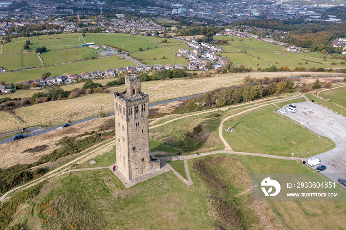 Aerial drone photo of the famous Castle Hill, a scheduled ancient monument in Almondbury overlooking Huddersfield in the Metropolitan Borough of Kirklees, West Yorkshire, England in the autumn time.