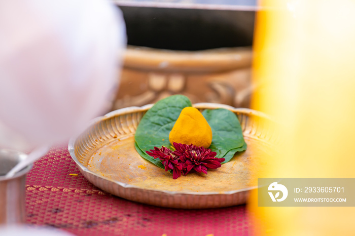 South Indian Tamil wedding ceremony ritual items and hands close up