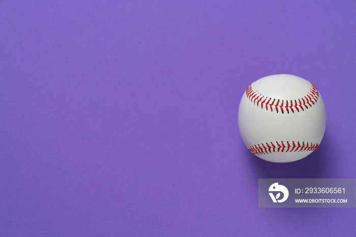 baseball on purple table background, top view sport concept