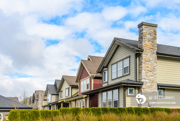 A perfect neighborhood. Houses in suburb at Spring in the north America.