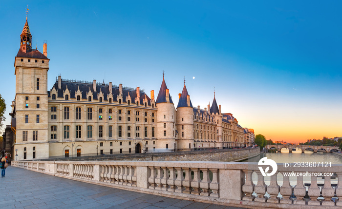 Beautiful panoramic view of Seine and Conciergerie at sunrise in Paris, France
