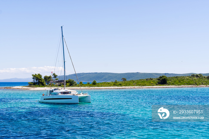 Catamaran sailing in ocean. paradise at sea. Blue sky and turquoise blue sea water. Mexican Caribbean beaches.