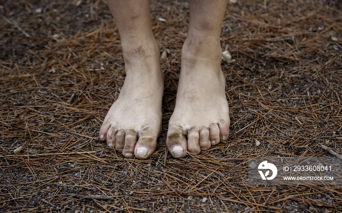 Dirty feet in forest