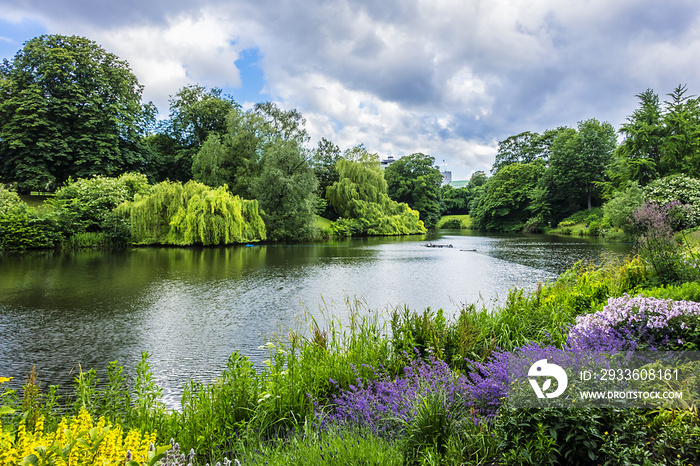 View of Orsted park (Orstedsparken, 1879) - a public park in central Copenhagen. Orsted Park is one in a series of parks which laid out on grounds of old fortification ring. Copenhagen, Denmark.