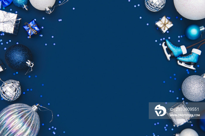 Navy Christmas borders background. Elegant Blue background with shiny Christmas decorations and copy space.