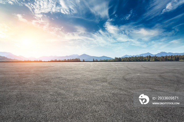 Asphalt square road and hills with sky clouds landscape at sunset