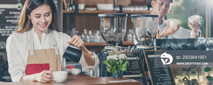 Banner of Asian Barista preparing cup of coffee, espresso with latte or cappuccino for customer order in coffee shop,bartender pouring milk,Small business owner and startup in coffee shop concept