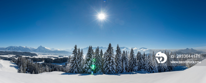 beautiful panoramic landscape wirh mountain range in Bavaria, Germany, at cold winter day