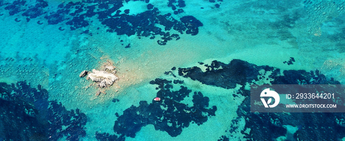 Aerial drone ultra wide photo of secluded turquoise exotic paradise bay with sandy beach