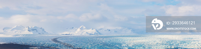 Glaciers and iceberg panorama in jokulsalon lagoon Iceland