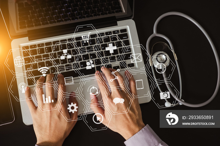 Medical doctor hand working with smart phone,digital tablet computer,stethoscope on black desk,virtu