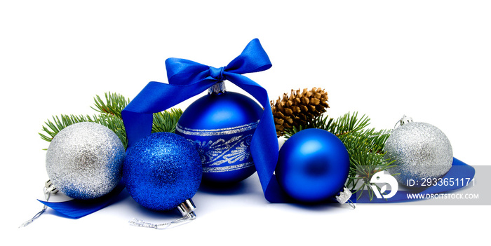 Christmas decoration blue and silver balls with fir cones and fir tree branches isolated