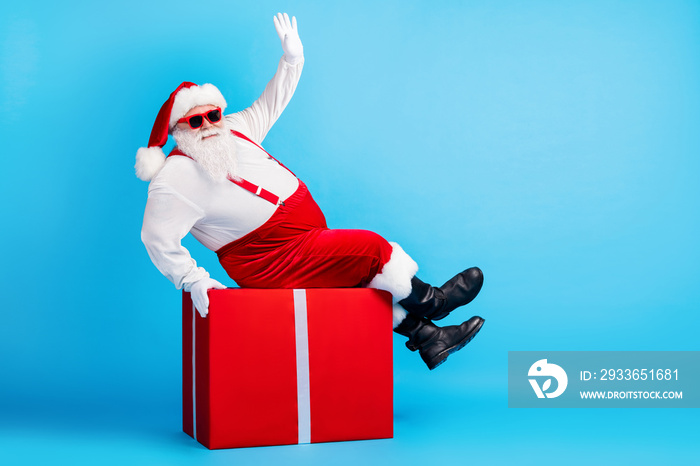 Full length photo of fat overweight santa claus with big stomach beard sit red gift box greeting x-m