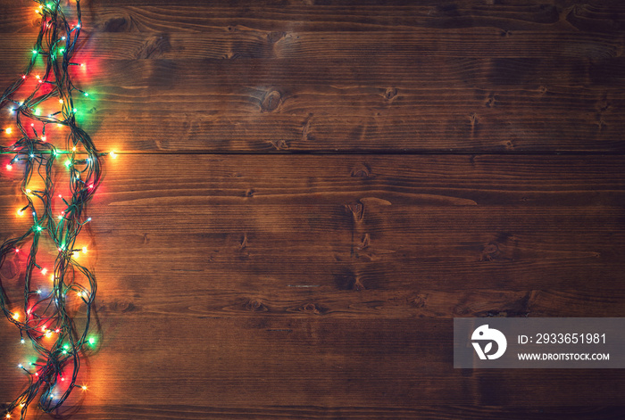 Empty rustic wooden background with Christmas lights