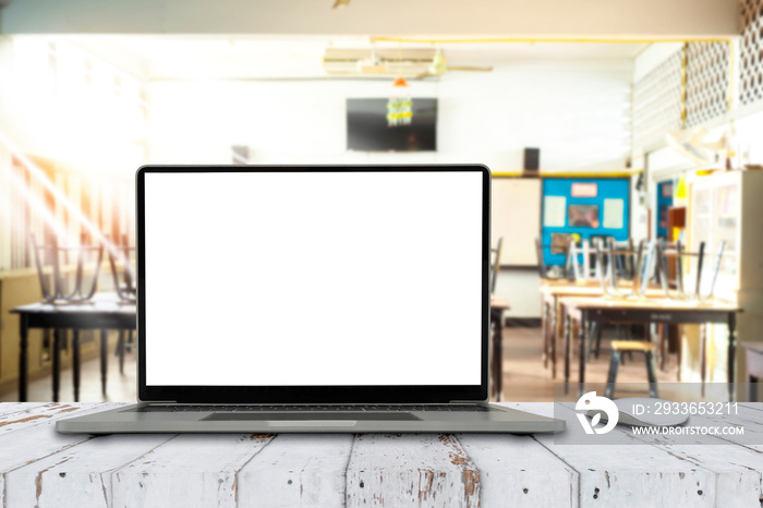 Front view of the laptop with blank screen on table