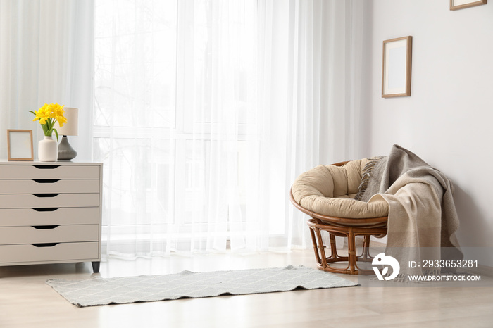 Interior of stylish living room with armchair