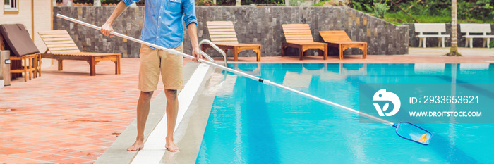 Cleaner of the swimming pool . Man in a blue shirt with cleaning equipment for swimming pools, sunny