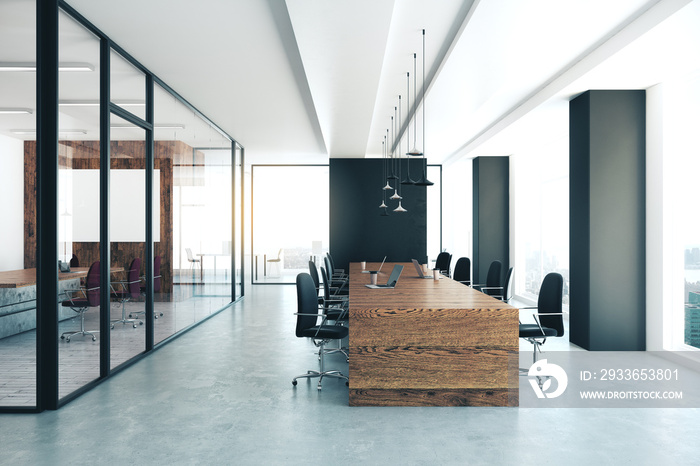 Modern conference room with equipment and city view.