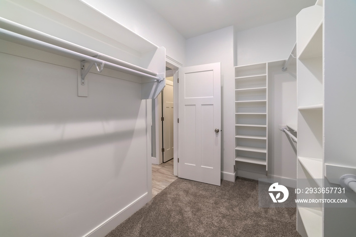 Interior of an empty walk-in closet or wardrobe