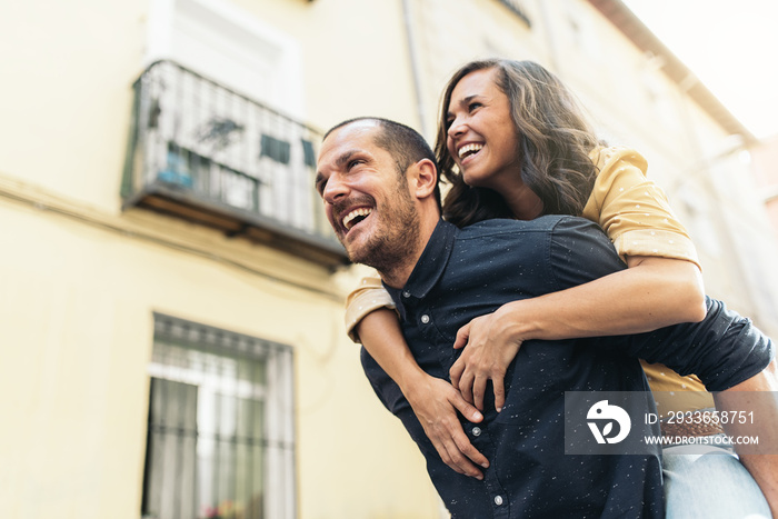 Smiling couple of lovers having fun.