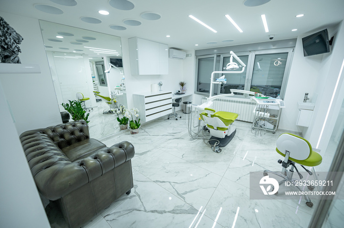 Interior of white modern dentistry medical room with special equipment