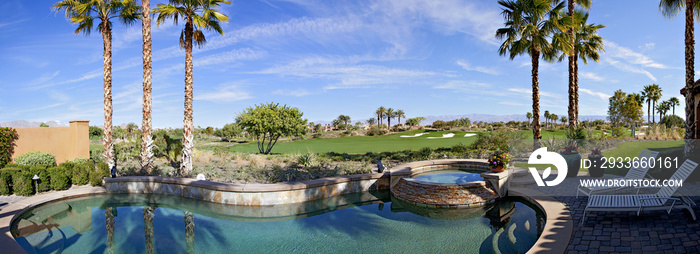 Panoramic view of swimming pool, hot tub and golf course