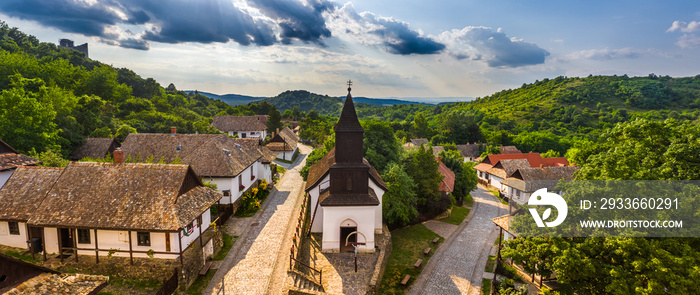 Holloko, Hungary - Aerial panoramic view of the traditional village centre of Holloko (Raven-stone), an UNESCO site in Hungary on a sunny summer day