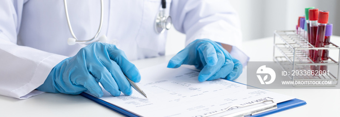 Closeup portrait, Scientists in white lab coats are analyzing the vital substance of the Blood vessels and Blister in a lab, Medical scientist for treatment concept. .