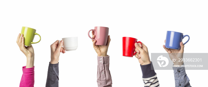 Many different hands holding multi colored cups of coffee on a white background. Female and male hands. Concept of a friendly team, a coffee break, meeting friends, morning in the team. Banner