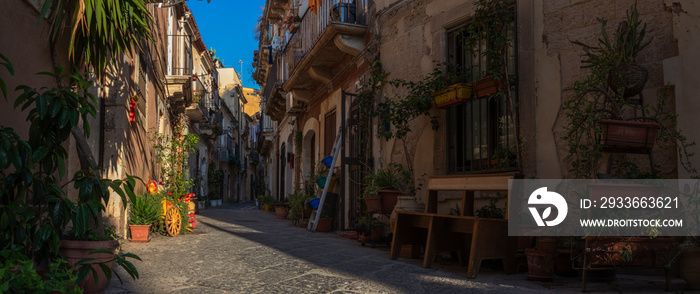 Cosy scenic street in the baroque UNESCO world heritage site Ortigia island in the province of Siracusa in Sicily, south Italy