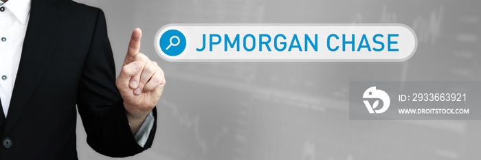 Jpmorgan Chase. Man in a suit points a finger at a search box. The word Jpmorgan Chase is in the search. Symbol for business, finance, statistics, analysis, economy